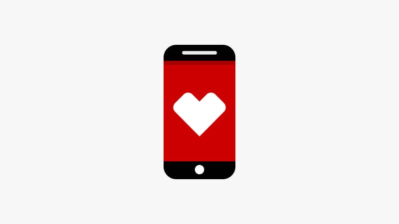 A pictogram of a cell phone screen with the CVS heart.